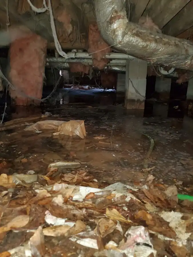 Crawl space flood assessment for Commercial Water Damage Restoration in Middlesex