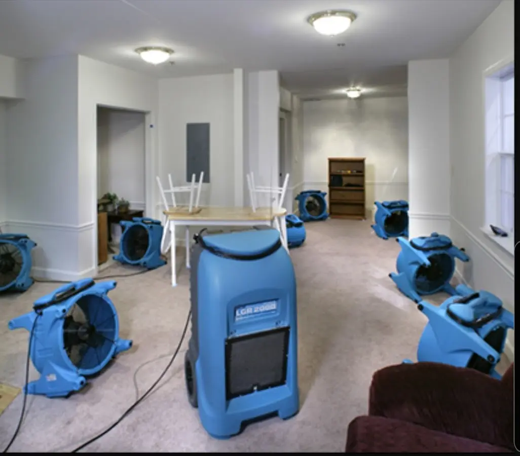 Air movers and dehumidifier setup for Water Damage Restoration in Middlesex